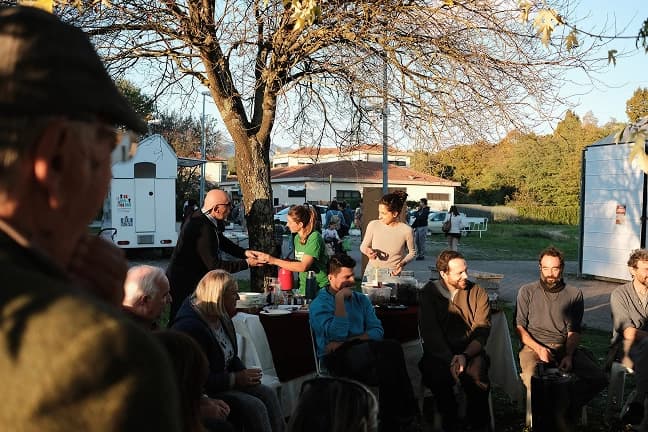 Outdoor community gathering with diverse people